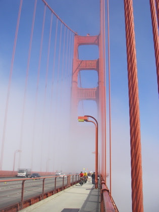 The Golden Gate Bridge, peeping through the mist